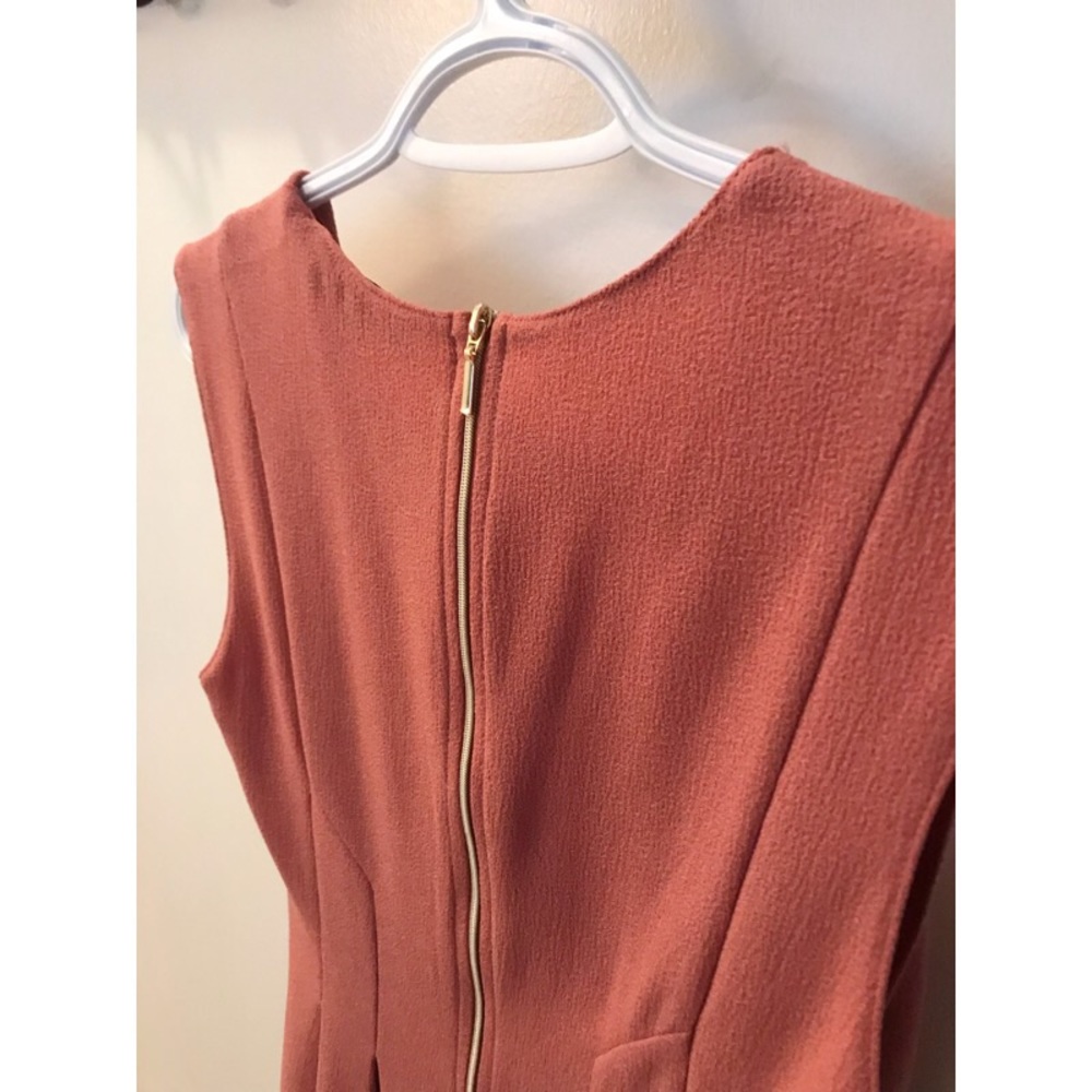 Pink peplum style dress